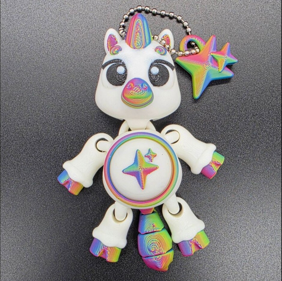 White and rainbow unicorn keyboard clicker